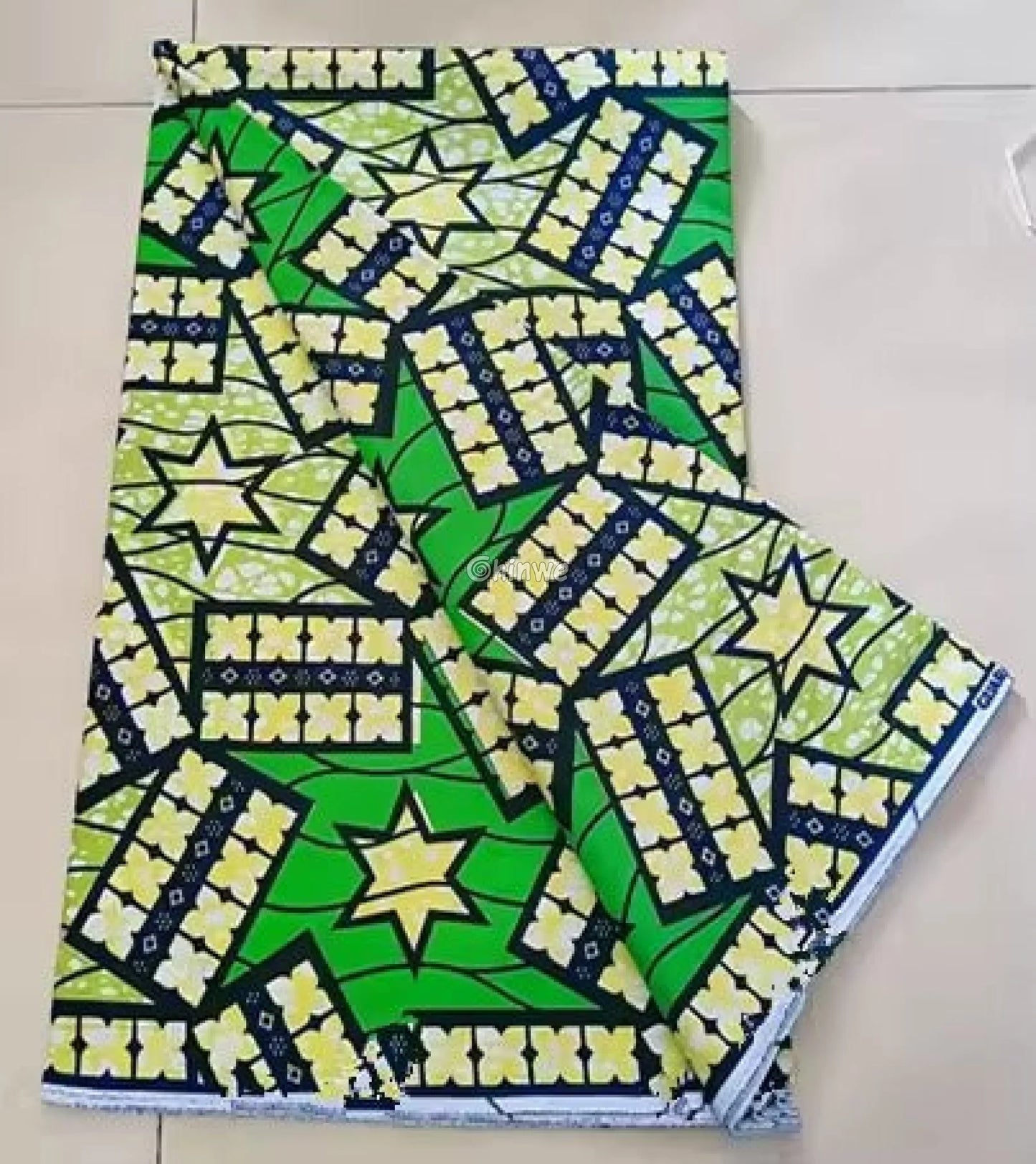 Green and Yellow Ankara Fabric with Star and Floral Patterns
