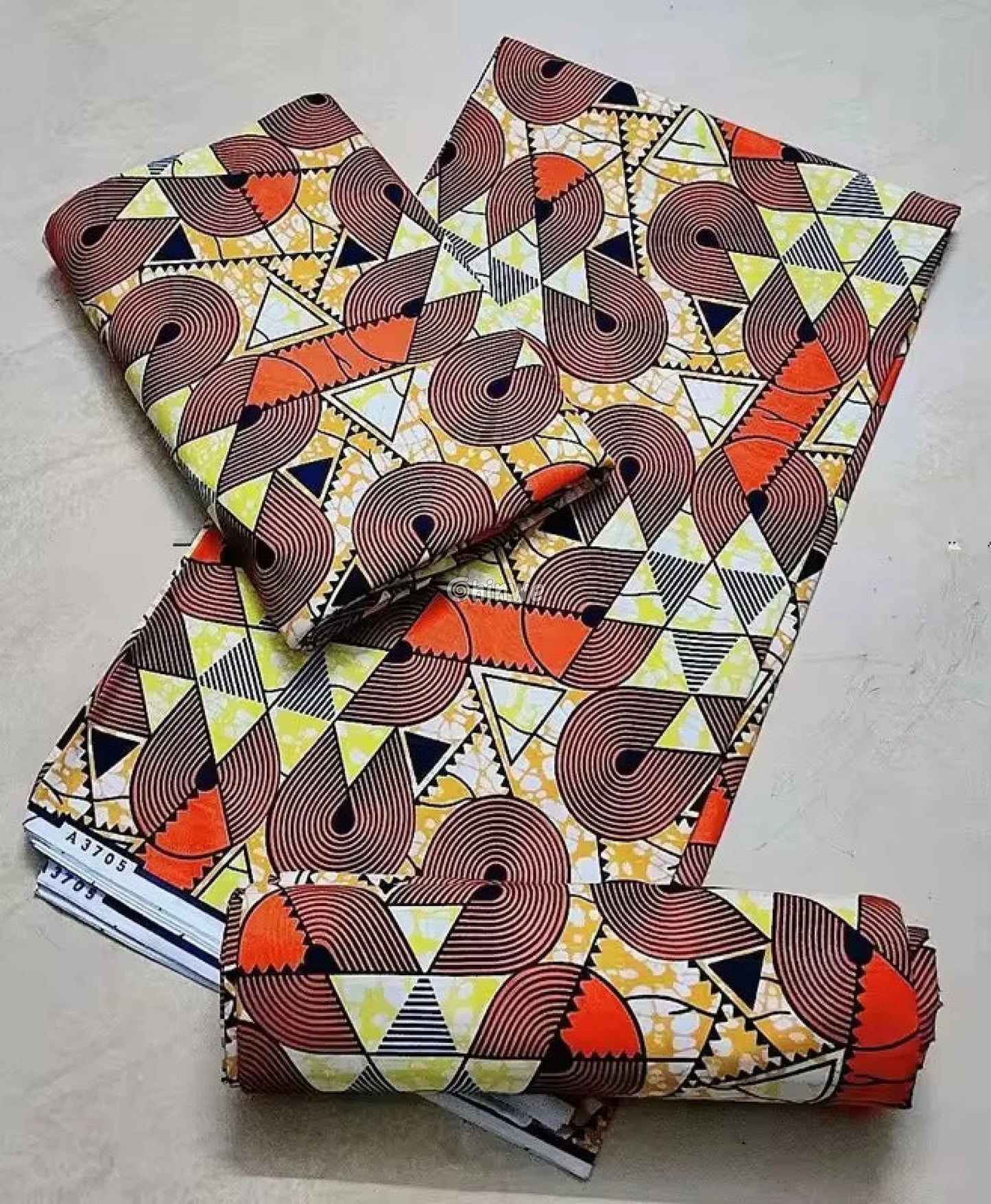 Orange and Yellow Geometric Ankara Wax Print Fabric with Circular and Triangle Design