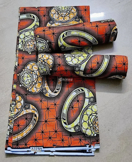 Orange and Yellow Rings Ankara Wax Print Fabric with Starry Design