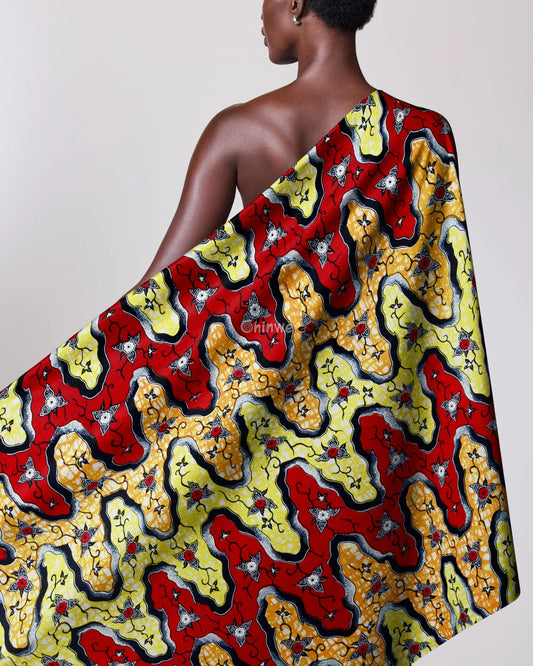 Red and Yellow Floral Ankara Wax Print Fabric with Wave and Star Design