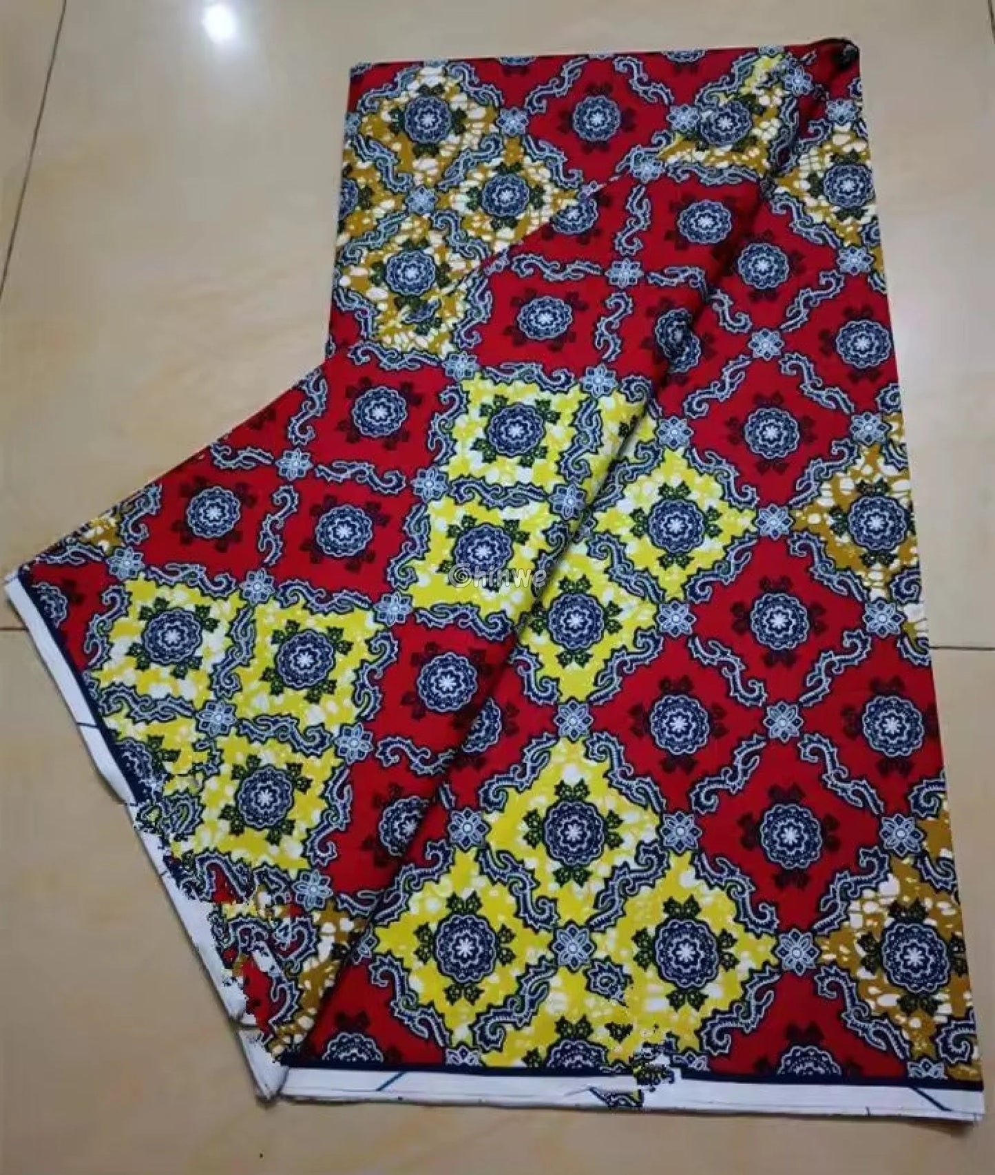 Red and Yellow Geometric Ankara Wax Print Fabric with Ornamental Design