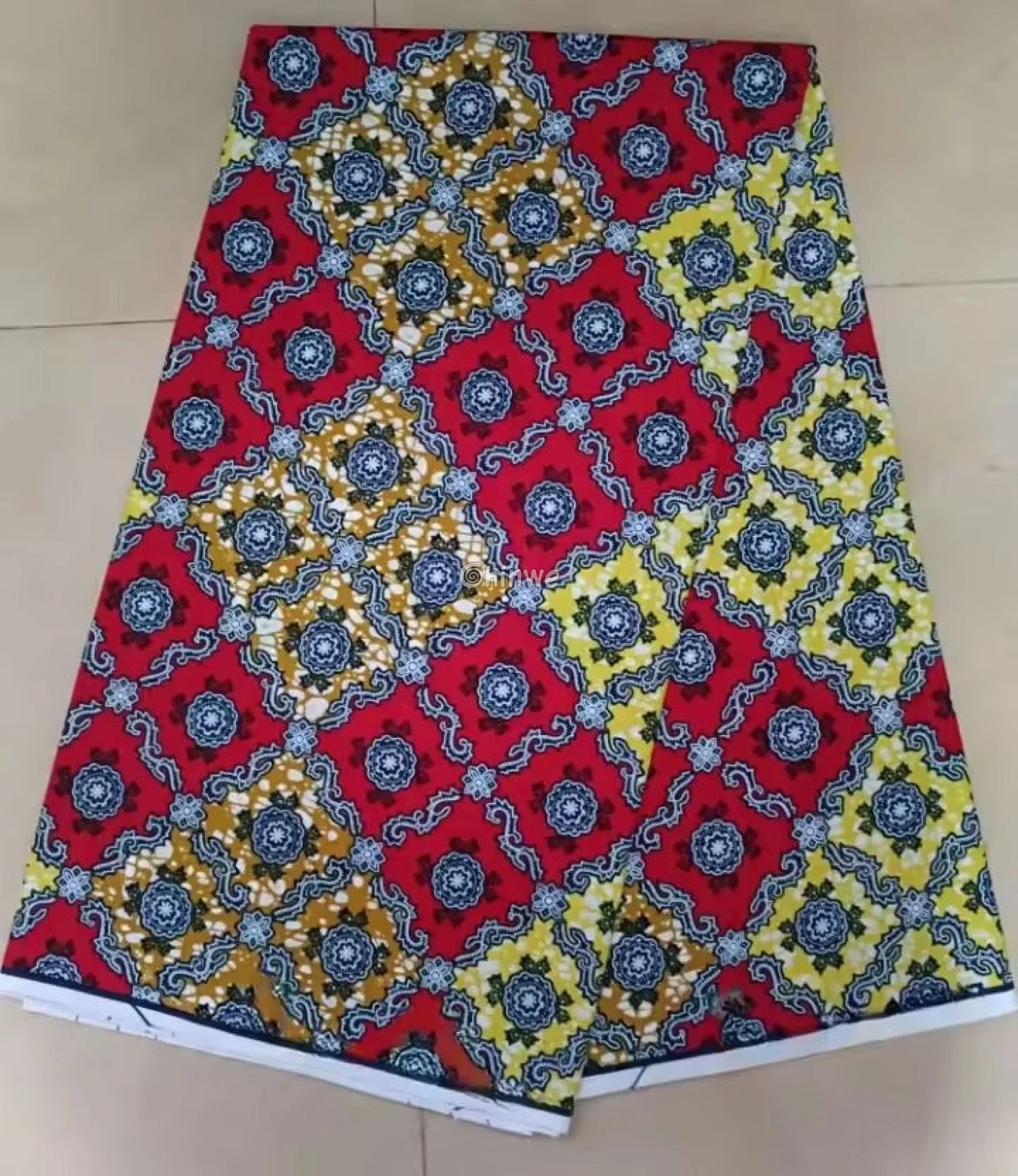 Red and Yellow Geometric Ankara Wax Print Fabric with Ornamental Design