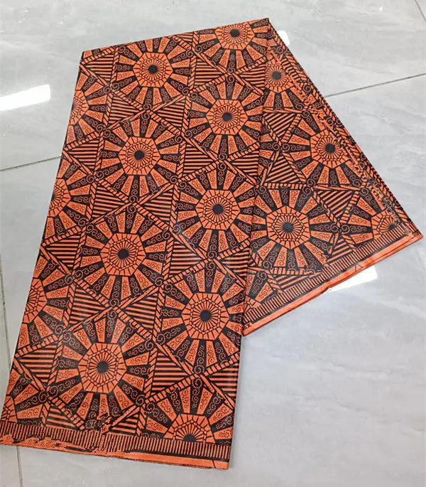Coral Sunburst Two-Tone Ankara Real Wax Print – Coral & Black Wheels, 100% Cotton, 6 Yards