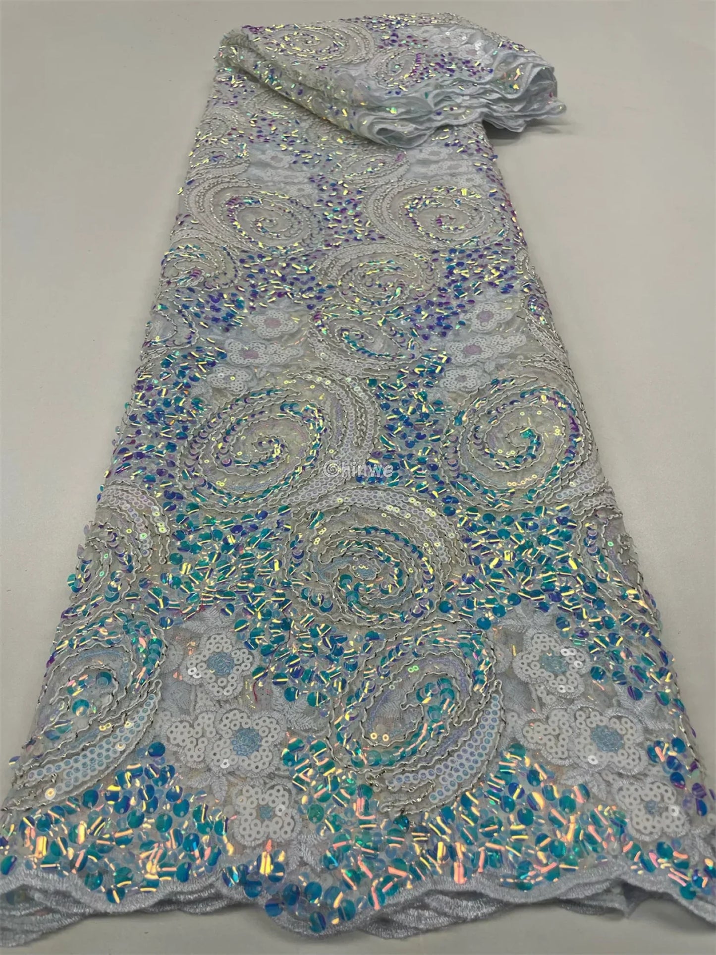 Sequined Spiral Paisley Lace with Beaded Floral Detailing on Sheer Mesh Base Pale silver-blue with aurora swirl beading