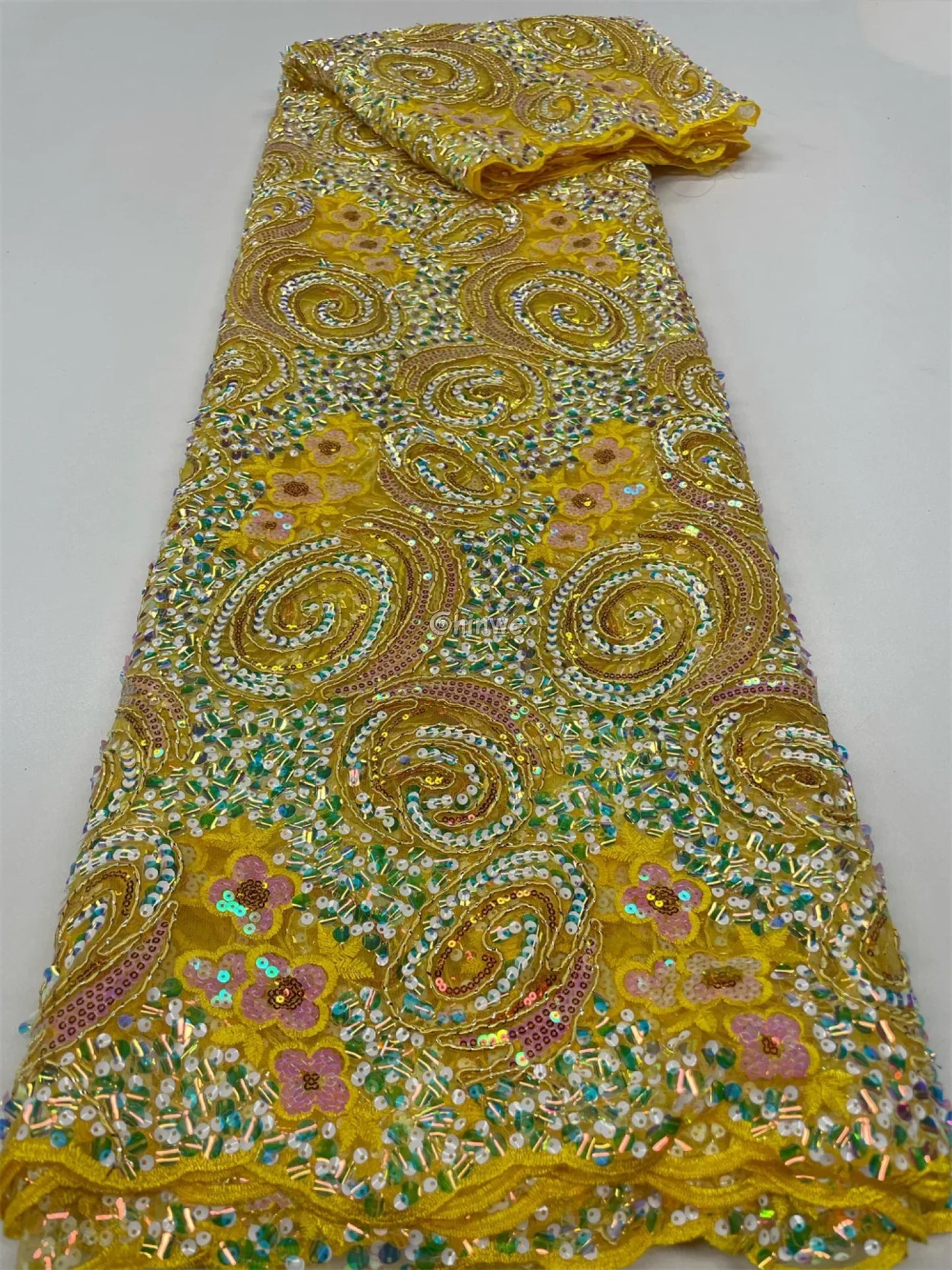 Sequined Spiral Paisley Lace with Beaded Floral Detailing on Sheer Mesh Base Bright yellow base with pastel swirl