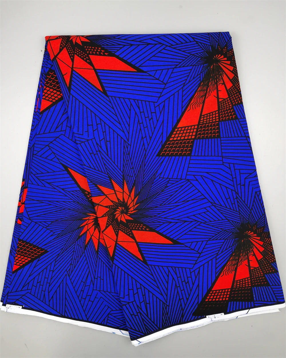 Red Pinwheel Burst on Royal Blue Ankara Real Wax Print – 100% Cotton, 6 Yards
