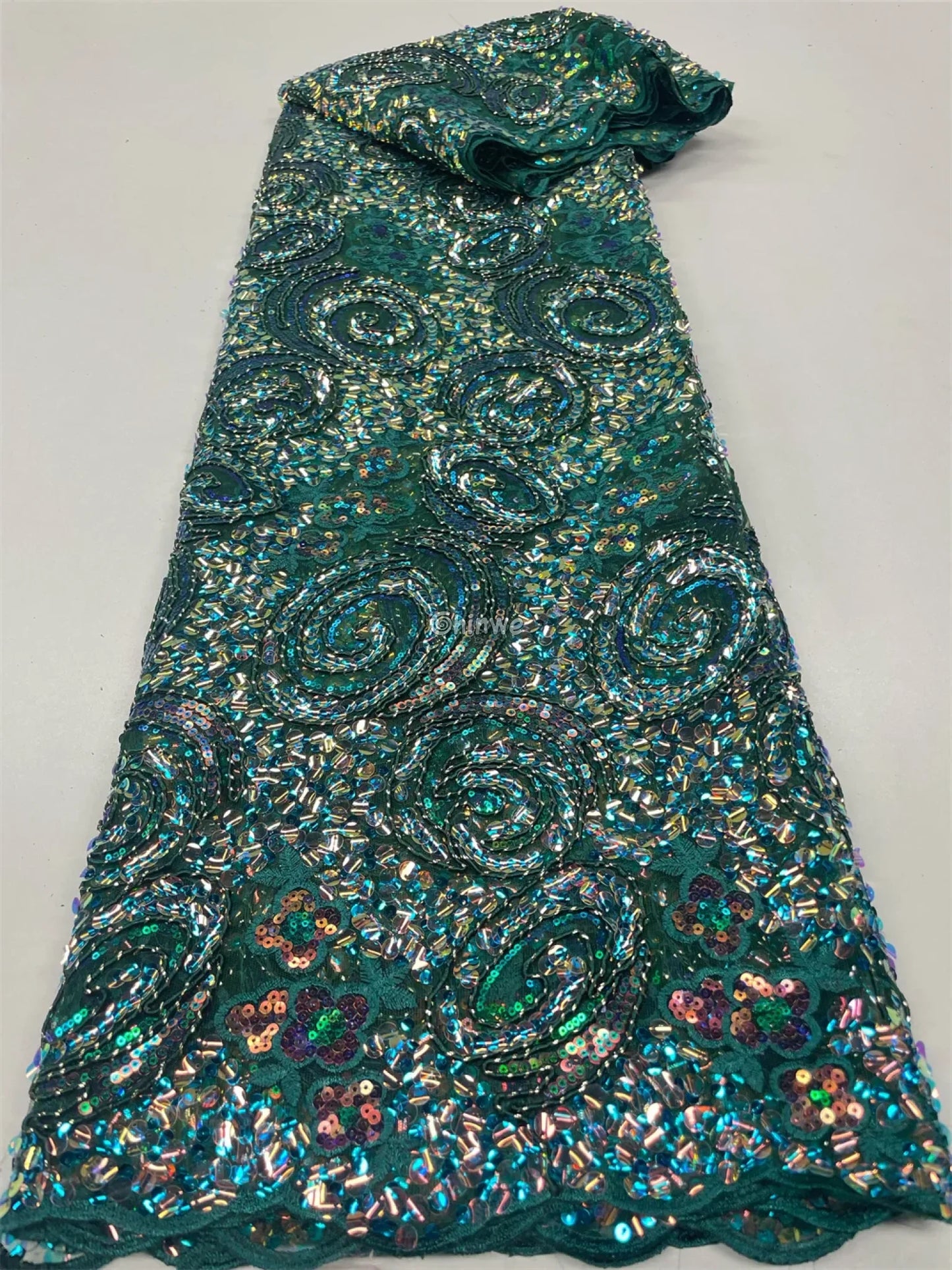 Sequined Spiral Paisley Lace with Beaded Floral Detailing on Sheer Mesh Base Emerald green with iridescent spiral