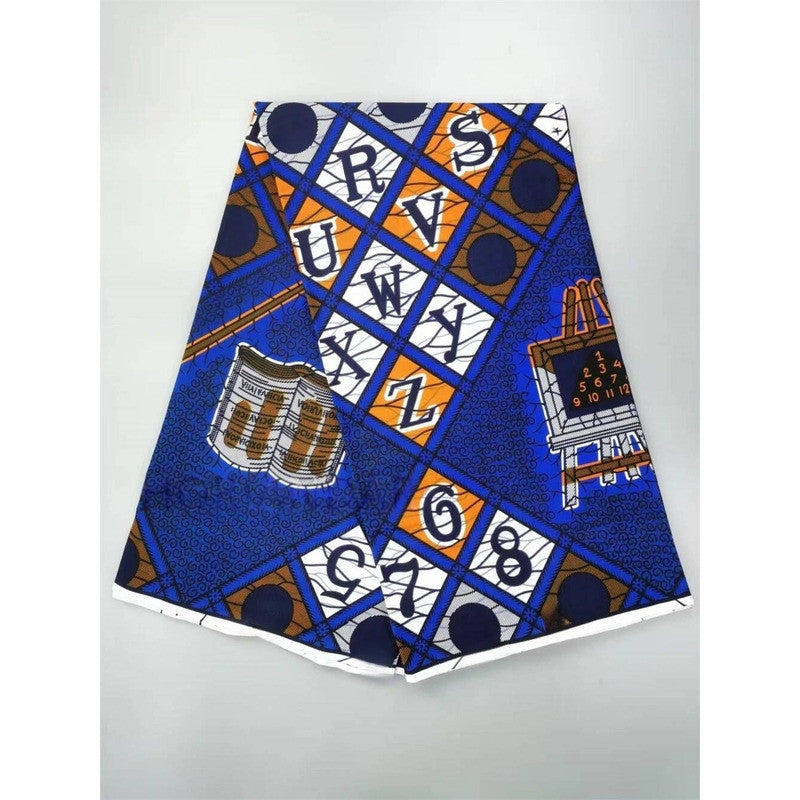 Blue alphabet Ankara wax print, folded