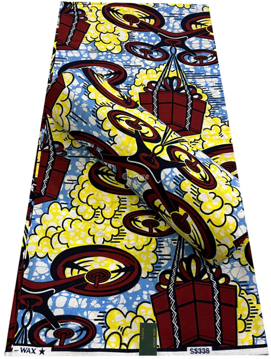 Crimson Drone & Parcel Motif on Sky Blue with Yellow Cloud Bursts and White Crackle Batik Detailing Sky Blue Delivery