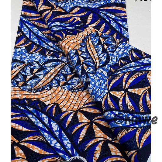 Blue and Orange Layered Leaf Motif with Curved Bands and Batik Dot Texture on African Wax Print Cotton