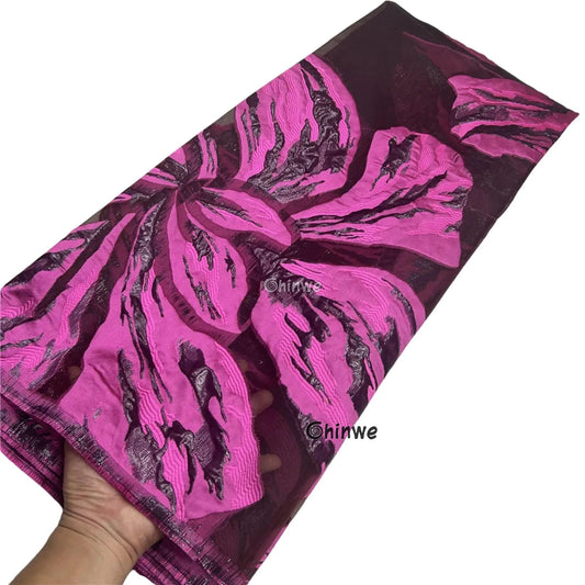 Metallic jacquard brocade with floral embossing and lustrous sheen in multi-tone blossom motif