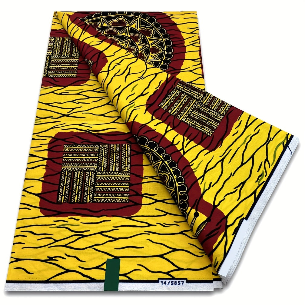 Yellow Ankara wax print with red medallions, folded