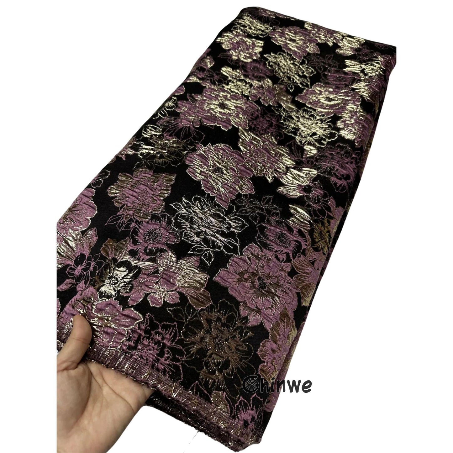 Metallic jacquard damask with raised floral pattern and gilded finish, embroidered on tulle base