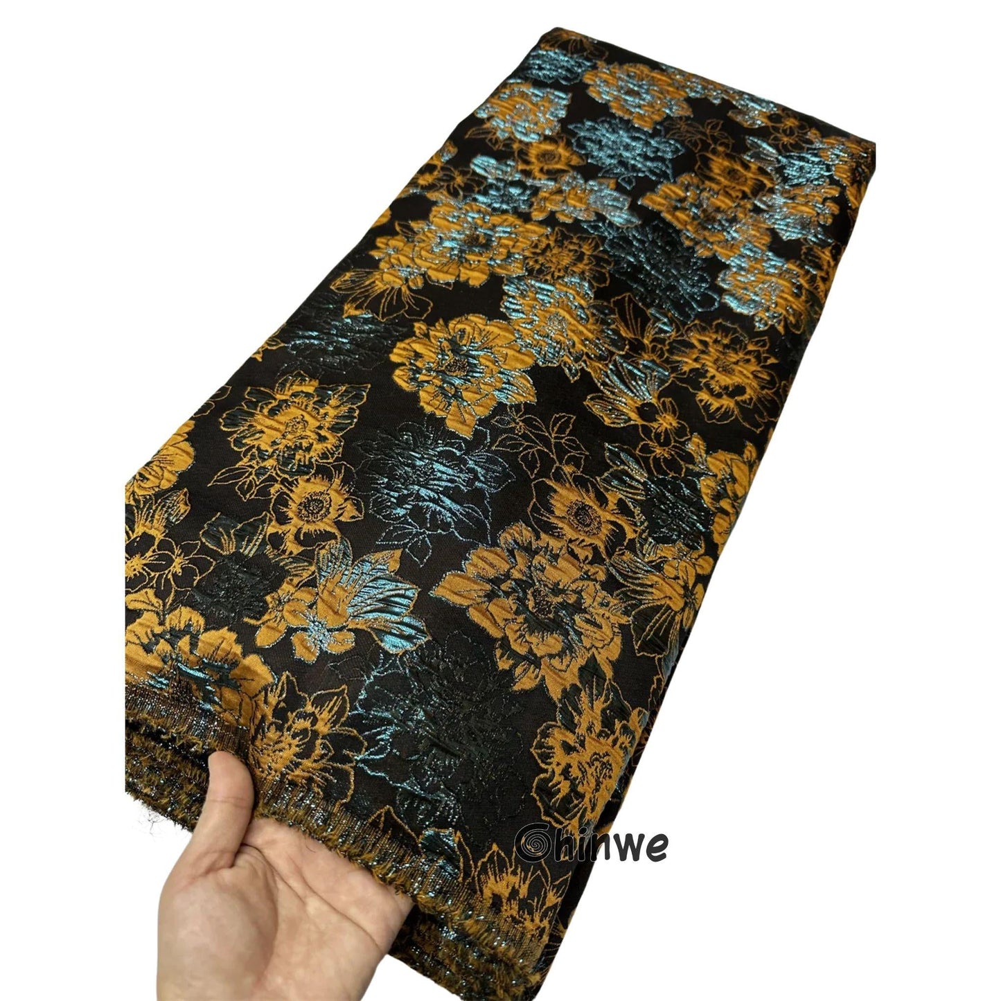 Metallic jacquard damask with raised floral pattern and gilded finish, embroidered on tulle base