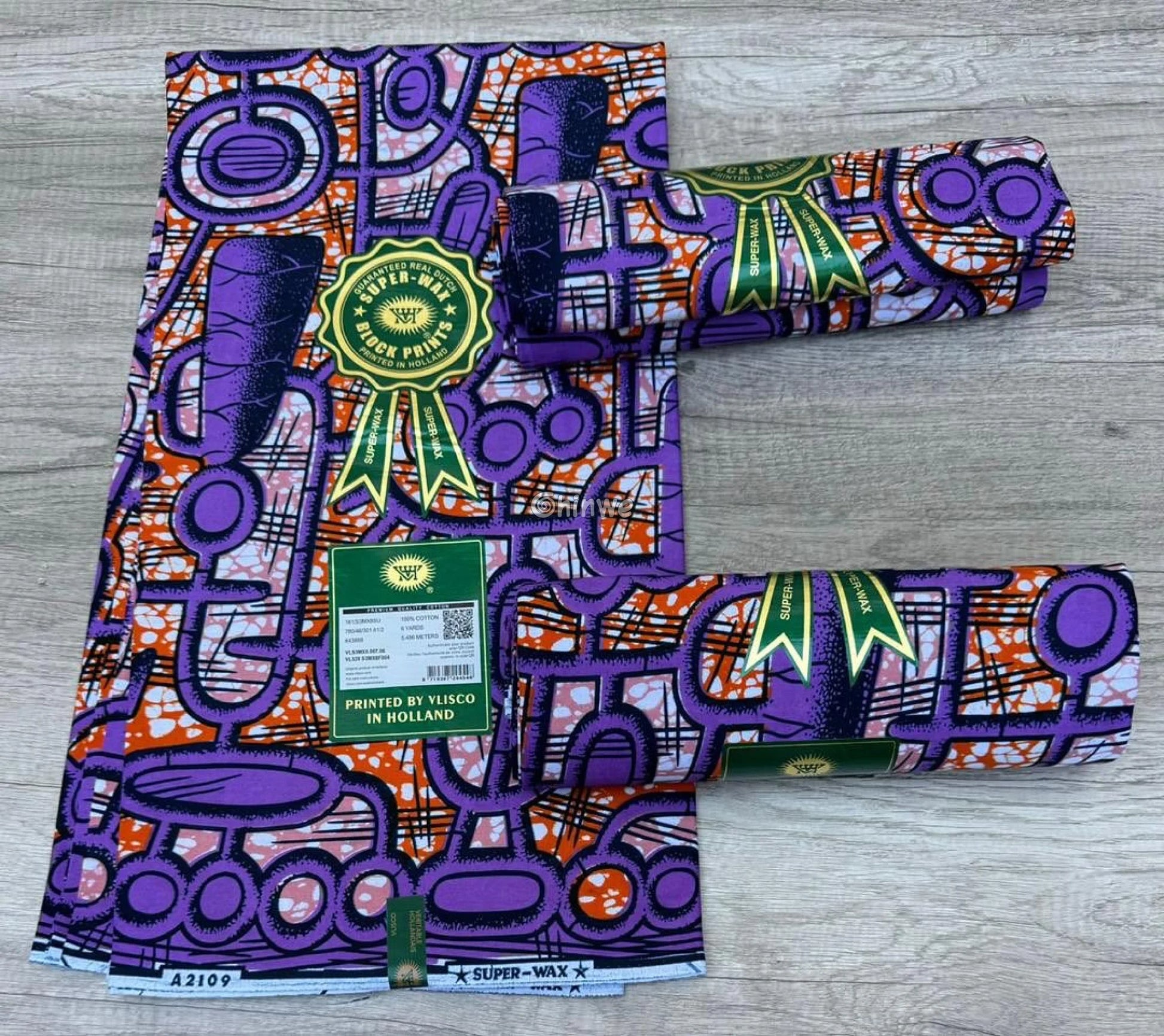 Abstract Textile Design with Bold Purple and Geometric Patterns