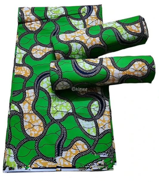 Green and Yellow Abstract Ankara Wax Print Fabric with Curved Line Design

