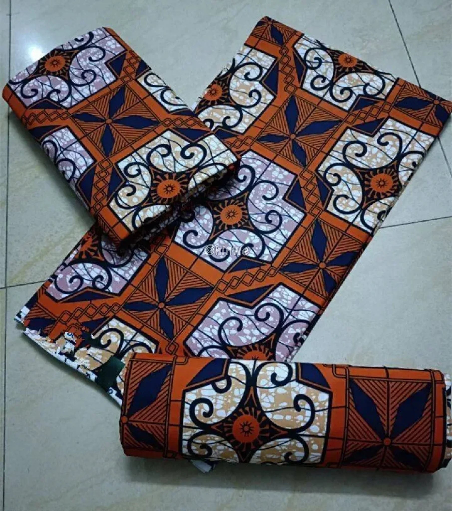 Orange and Navy Blue Geometric Ankara Wax Print Fabric with Ornamental Design