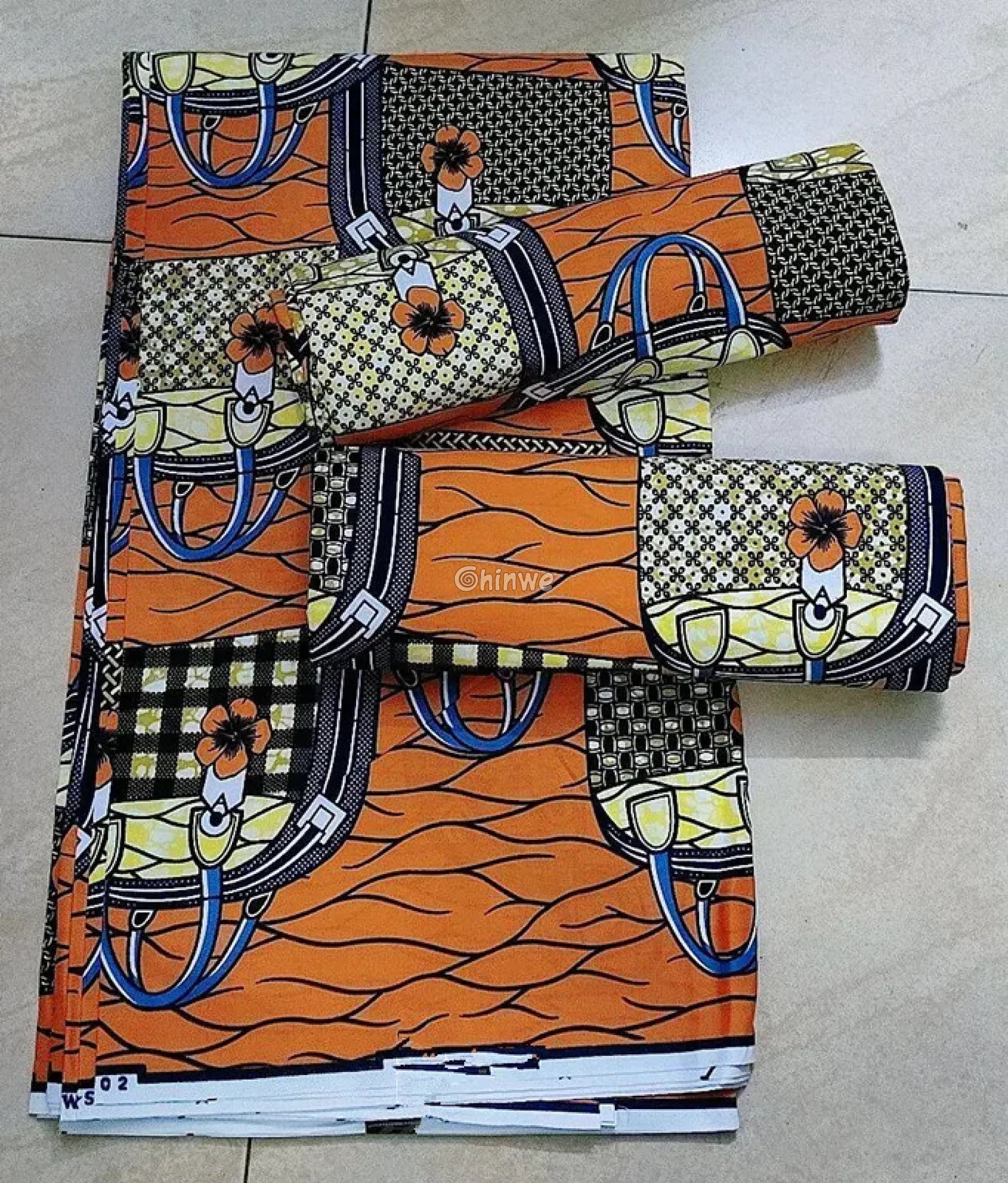Orange and Black Checkered Ankara Wax Print Fabric with Bag and Flower Design