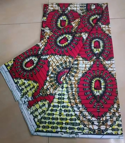Red and Yellow Abstract Ankara Wax Print Fabric with Eyelet Design