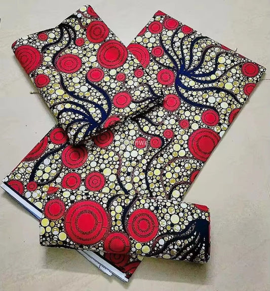 Red and Yellow Circular Ankara Wax Print Fabric with Bold Wave Design