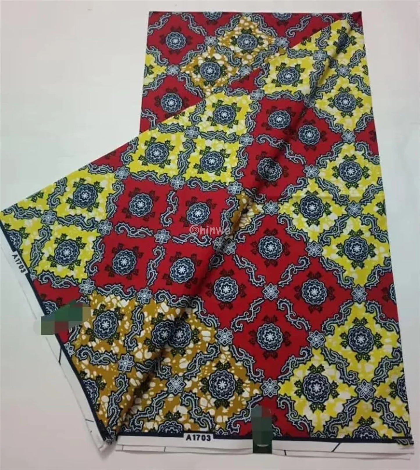 Red and Yellow Geometric Ankara Wax Print Fabric with Ornamental Design