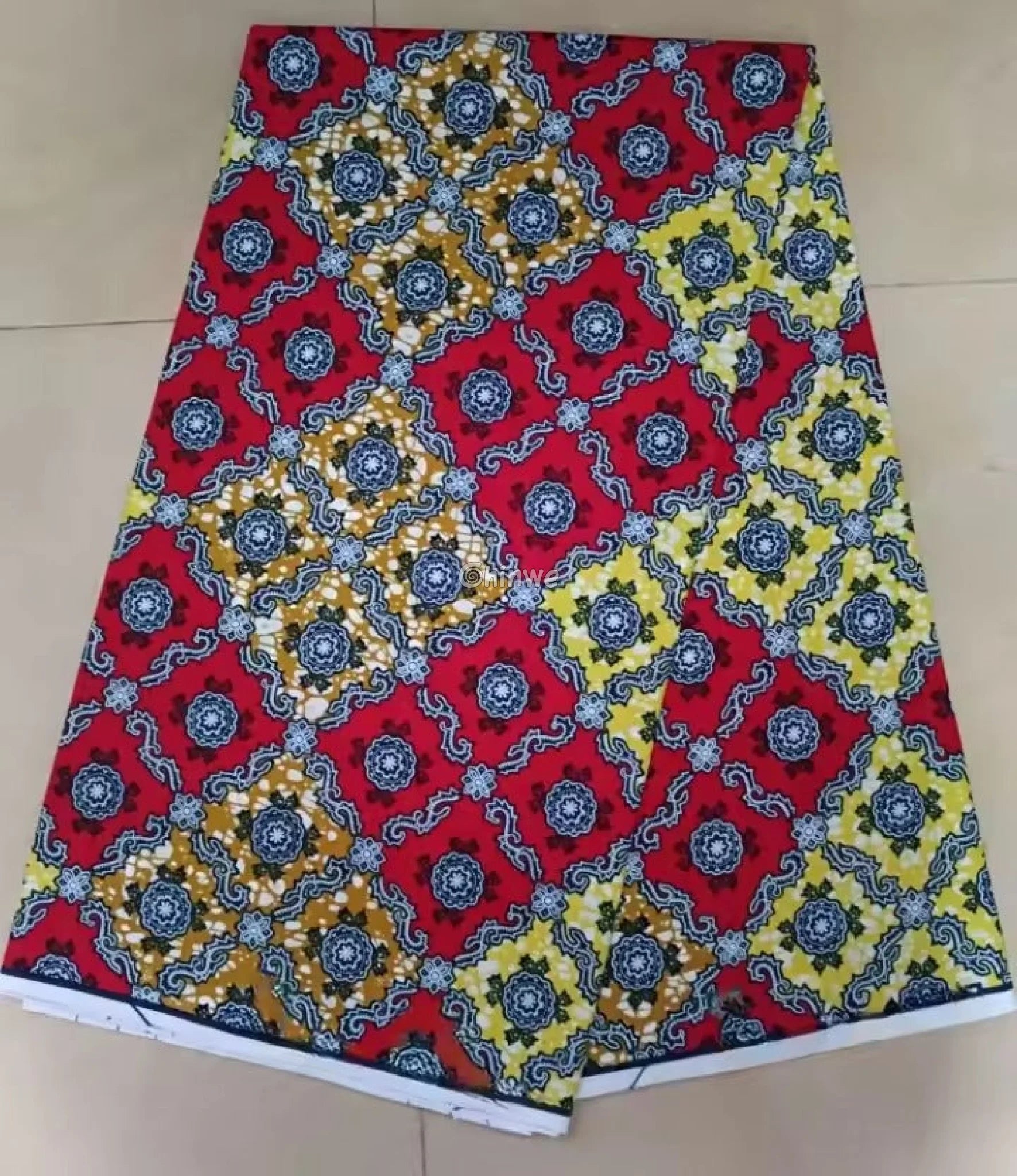 Red and Yellow Geometric Ankara Wax Print Fabric with Ornamental Design