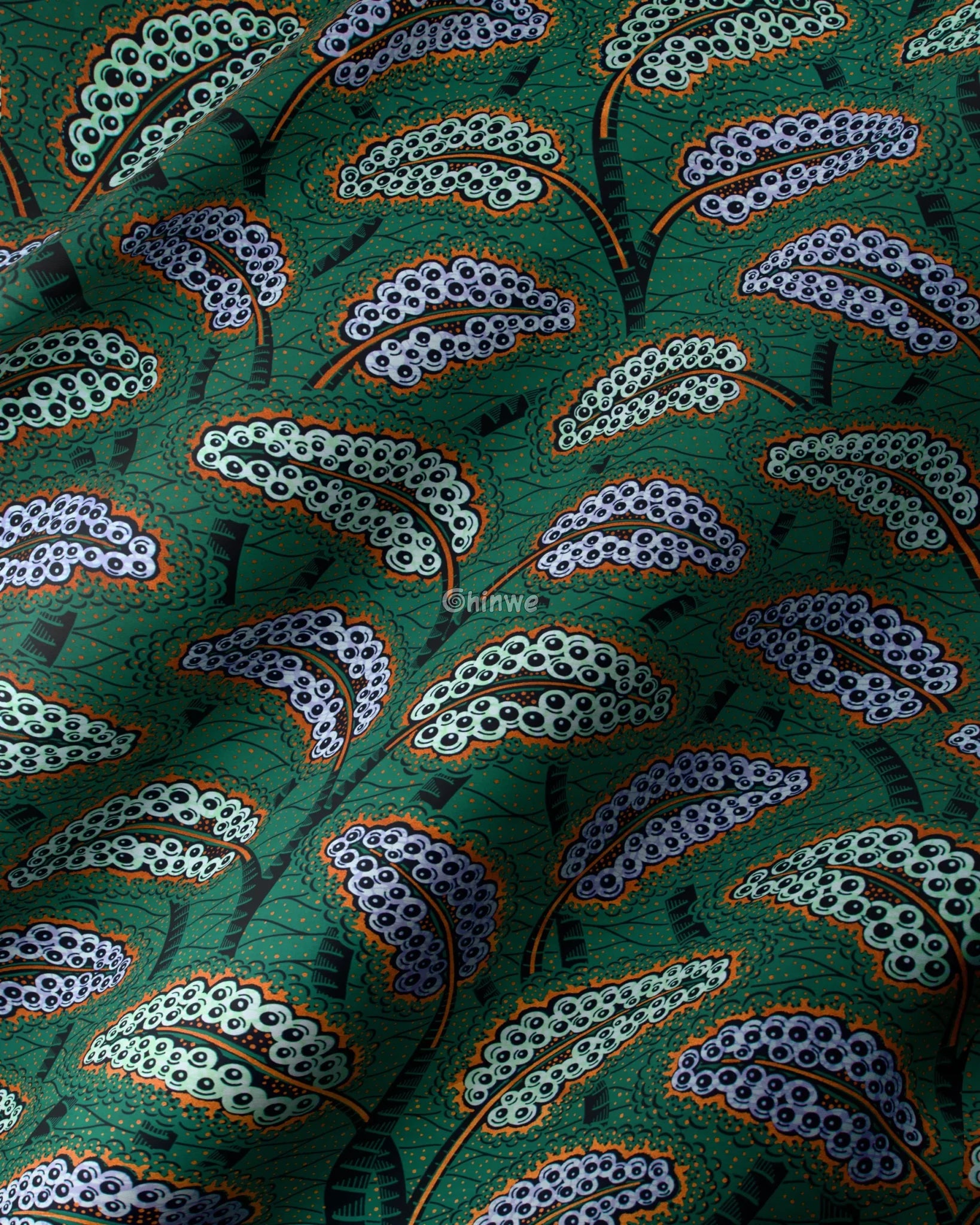 Rich Green Ankara Fabric with Vibrant Paisley Patterns