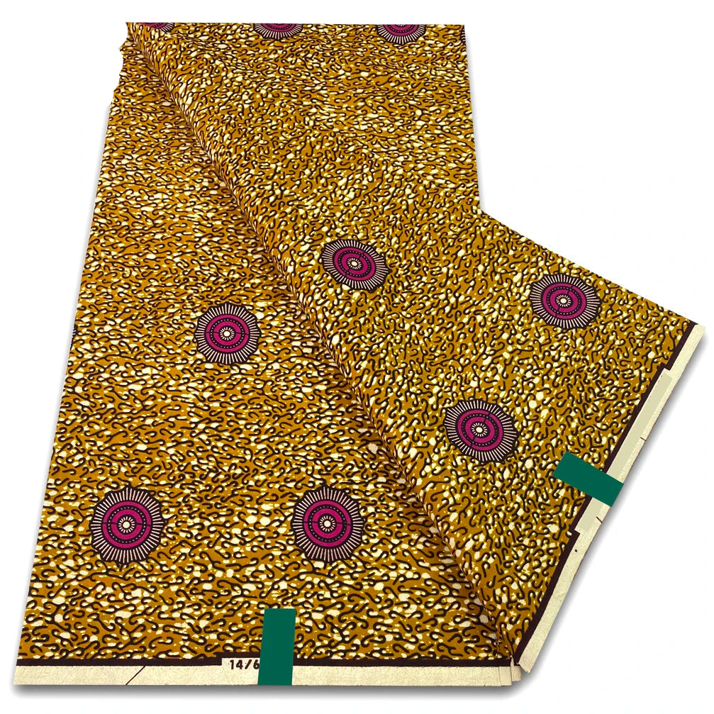 Mustard gold speckled Ankara wax print fabric with magenta ring motifs, folded 6-yard piece