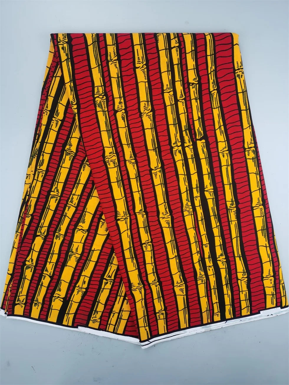 Red and yellow bamboo stripe Ankara, folded piece