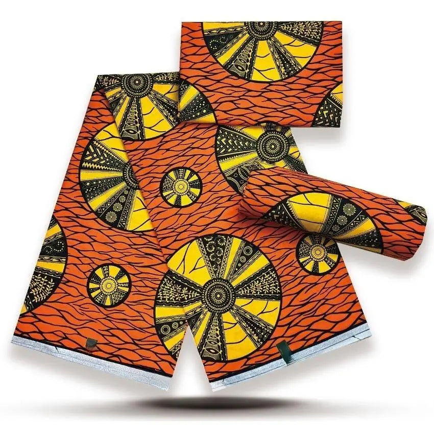 Orange Wheel Medallion Gold Sand Wax Print – Yellow & Black Sun Wheels, 100% Cotton, 6 Yards