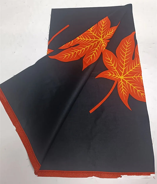 Orange Maple Leaf on Black Ankara Real Wax Print – Bold Single Motif, 100% Cotton, 6 Yards