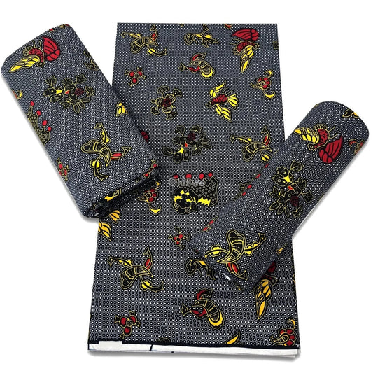 Yellow and Red Stylized Horn and Crown Symbols on a Black Microdot Grid with White Ring Texture Black / 6 yards African