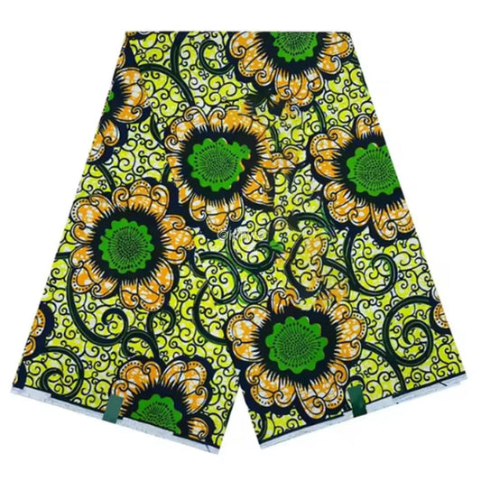 Sunny Flower Green and Orange Floral Ankara Fabric with Swirl Patterns