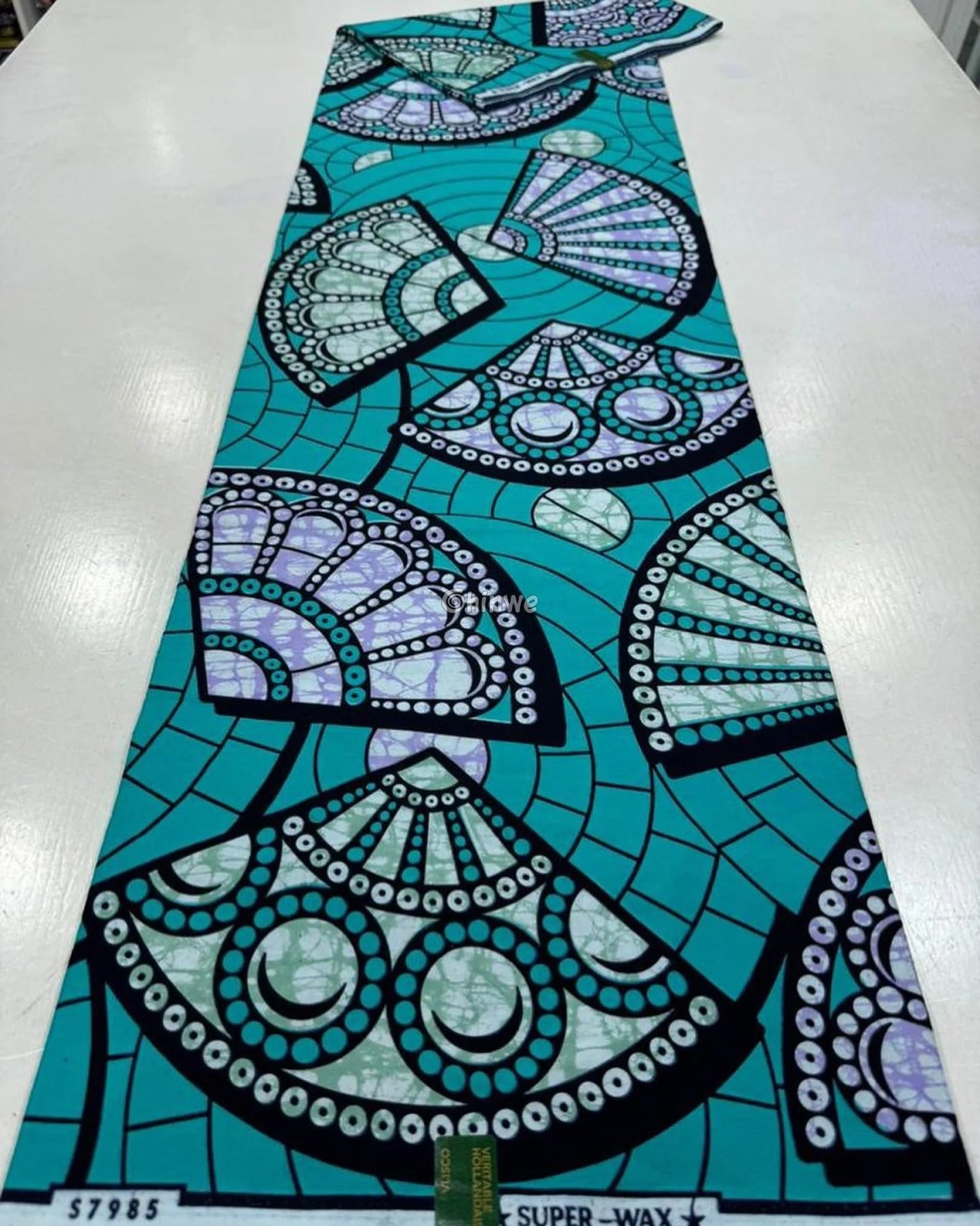 Vibrant Blue Ankara Fabric with Yellow Floral Elegance