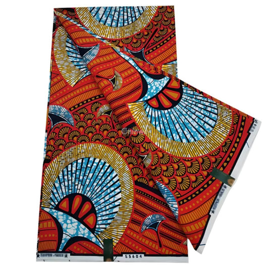 Vibrant Red and Blue Ankara Fabric with Radiant Sunburst Pattern
