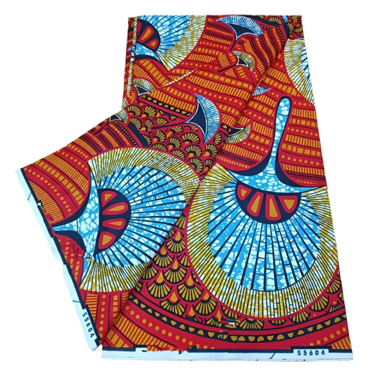 Vibrant Red and Blue Ankara Fabric with Radiant Sunburst Pattern