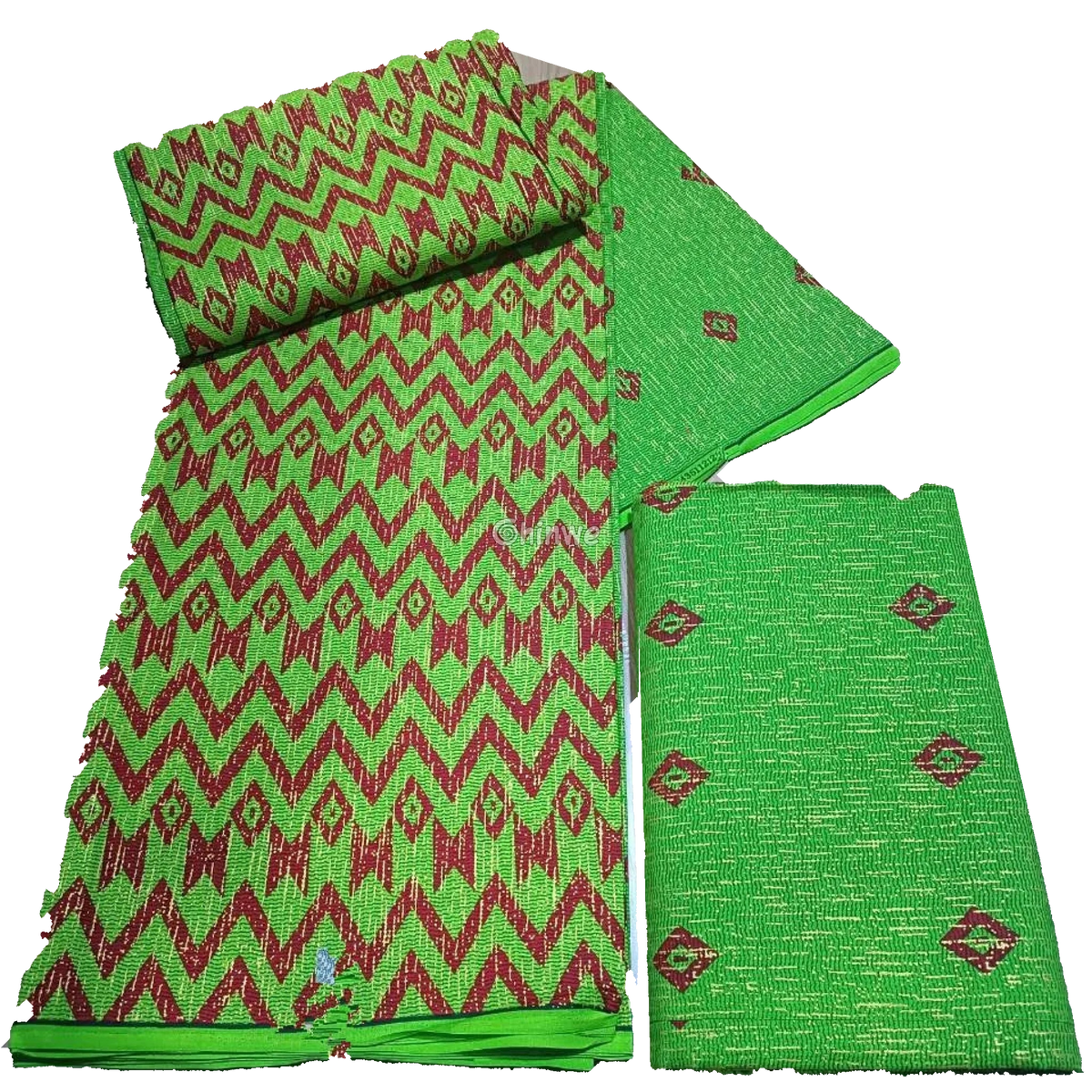 Lime green and red Kente brocade fabric with zigzag chevron pattern, folded pieces