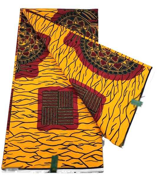 Yellow Ankara wax print with red medallions and woven squares