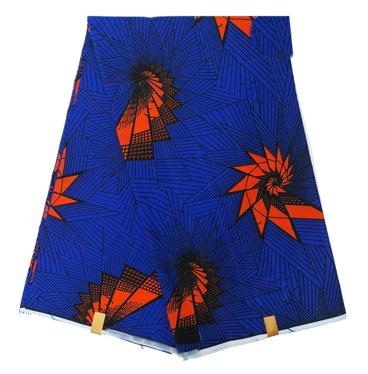 Royal blue Ankara wax print with orange starbursts